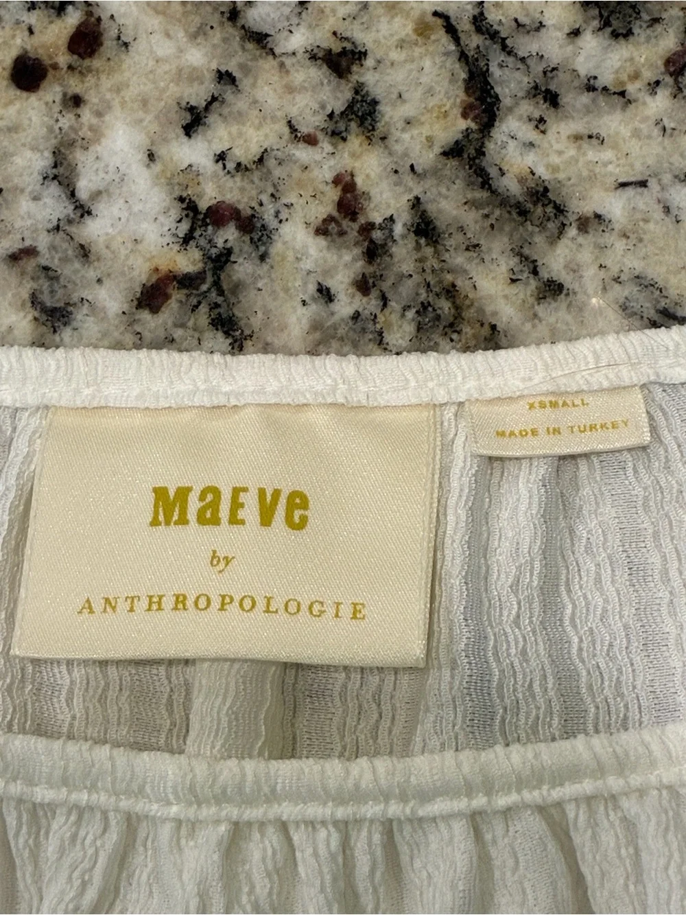 Anthropologie Cream Puff-Sleeve Peplum Blouse
